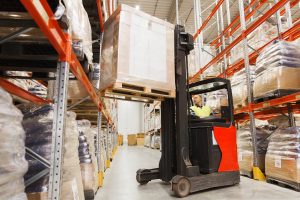 Forklift in warehouse facility